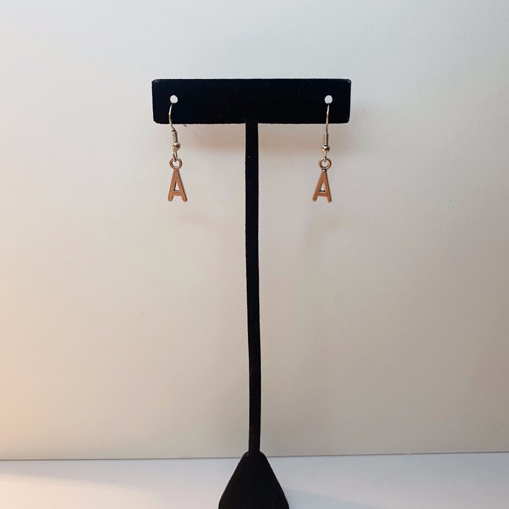Alphabet Earrings Each Pair sold separately.